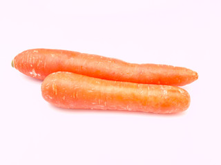 Fresh carrots isolated on white background