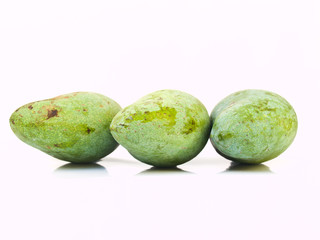 Green mangoes from Thailand isolated on white background
