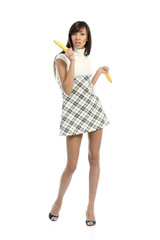 Positive attractive girl playing with banana