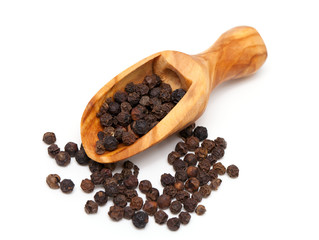 black pepper in a wooden scoop