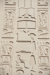 Egyptian hieroglyphic carvings on wall