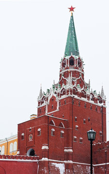 Kremlin Troitskaya Tower in winter snowing day