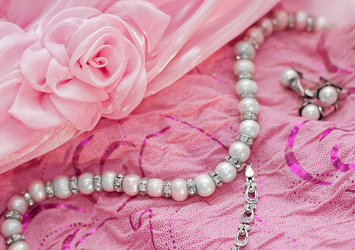 Closeup of silver pearl jewellery