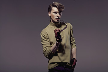 Elegant young handsome man with stylish haircut