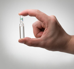 ampoule in a hand