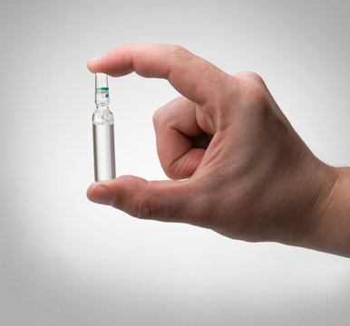 ampoule in a hand