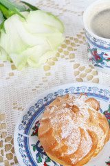 Profiteroles,white rose and coffee