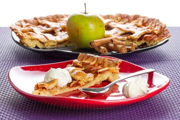 Apple tart  dessert with cream on the plate