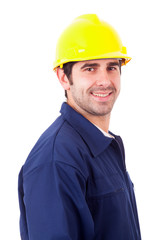 Portrait of a smiling young builder, isolated on white