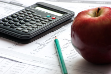 accounting paperwork with data files