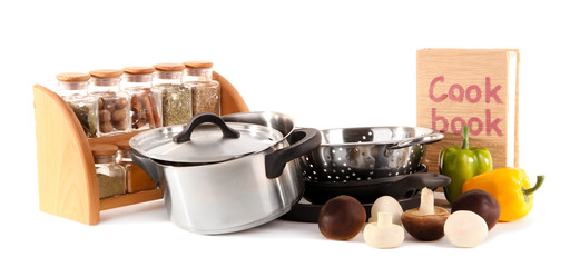 composition of kitchen tools,spices and vegetables isolated