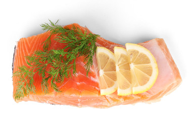 Fresh salmon fillet with herbals and lemon slices, isolated