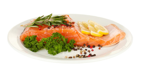 Fresh salmon fillet with herbals and lemon slices
