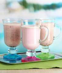 Cream cocktails on brightblue background