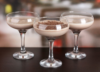 Cream cocktails on table in cafe