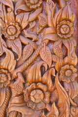 Wood carving decorated at windows of the temple, hand made by Th