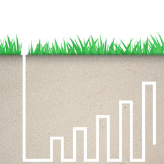 Green grass with graph icon in soil