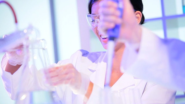 Multi Ethnic Medical Technicians Laboratory Equipment