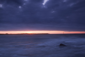 Beautiful baltic ocean scene, sunrise over the coast