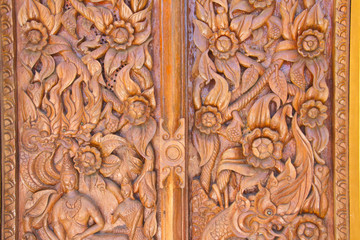 Wood carving decorated at windows of the temple, hand made by Th