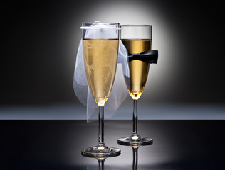 Champagne glasses with conceptual heterosexual decoration