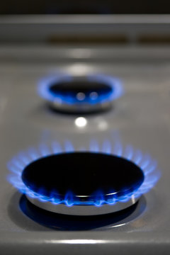 Burning gas cooker rings ready to cook