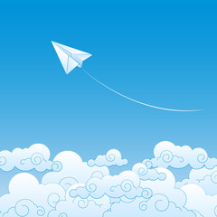 Paper plane against sky with clouds
