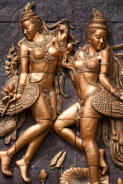 A Golden Kinnari statue