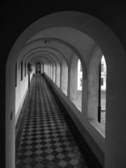 Corridor with arches B&W image