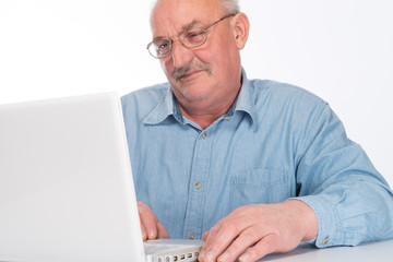 Mature man with laptop