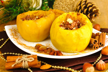 Baked apples on plate close up