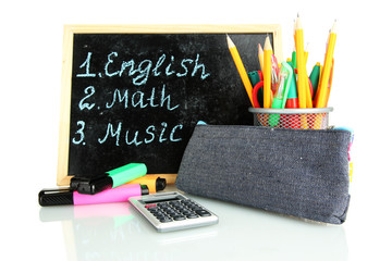 pencil box with school equipment and timetable isolated on
