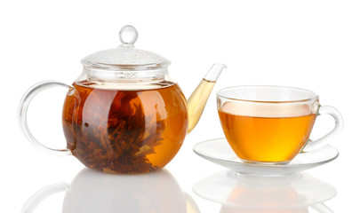 Exotic green tea with flowers in glass teapot isolated on white