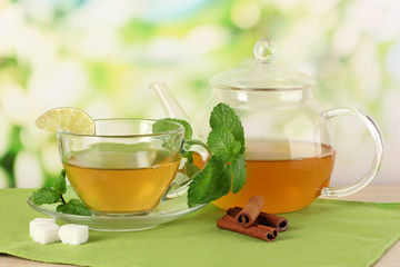 Cup of tea with mint,lime and cinnamon