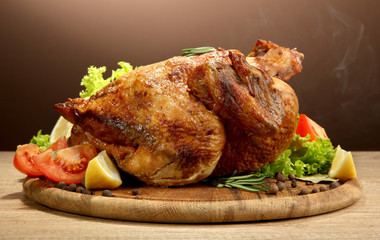Whole roasted chicken with vegetables,