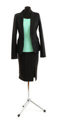 Turquoise blouse and black skirt with coat