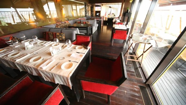 table stand in restaurant lounge near to terrace