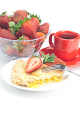 piece of apple pie, fork,cup of tea and strawberries isolated on