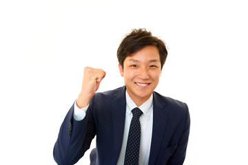 ガッツポーズのビジネスマン