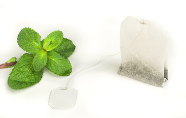 Tea bag and fresh mint