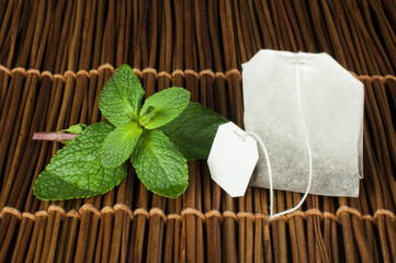 Tea bag and fresh mint