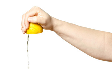 Hand squeezing lemon