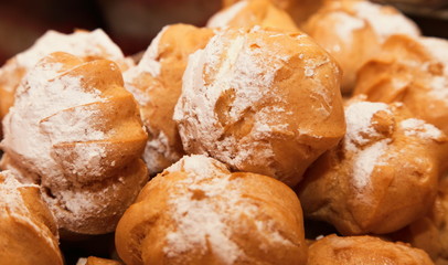 profiteroles choux pastry buns with whipped cream