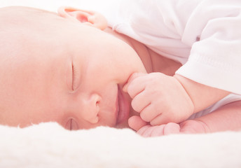 face of newborn baby sleeping