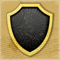 A golden shield on the vintage background