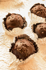 chocolate ball on white paper