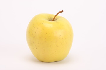 yellow apple on a white background