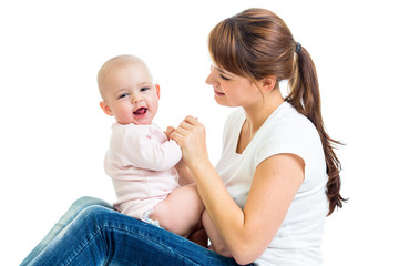 Loving mother having fun with her baby girl