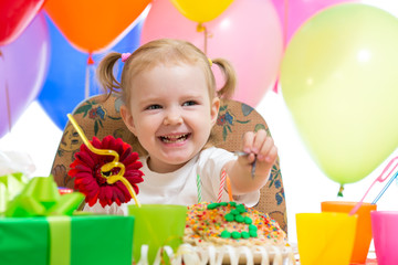 Fototapeta na wymiar happy child girl on birthday party