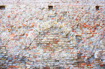 Italy, Ravenna medieval stone and brick wall